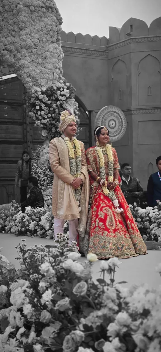 Selective-colour portrait of a bride and groom at their wedding ceremony